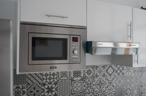 Kuchyň nebo kuchyňský kout v ubytování Coworking Studio