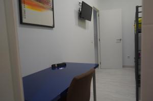 TV a/nebo společenská místnost v ubytování Coworking Studio