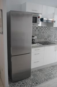 Kuchyň nebo kuchyňský kout v ubytování Coworking Studio