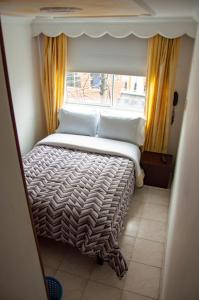 Postel nebo postele na pokoji v ubytování La Gran Fortaleza B&B