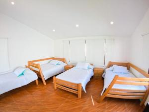 Postel nebo postele na pokoji v ubytování FINCA EL RECUERDO