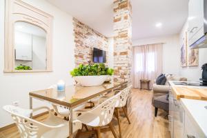 TV a/nebo společenská místnost v ubytování A&S APARTAMENTOS MALAGA I