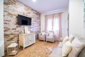 TV a/nebo společenská místnost v ubytování A&S APARTAMENTOS MALAGA I
