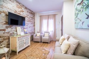 TV a/nebo společenská místnost v ubytování A&S APARTAMENTOS MALAGA I