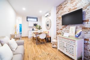 TV a/nebo společenská místnost v ubytování A&S APARTAMENTOS MALAGA I
