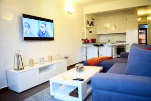 Een TV en/of entertainmentcenter bij Apartment in Marrakesh, Gueliz
