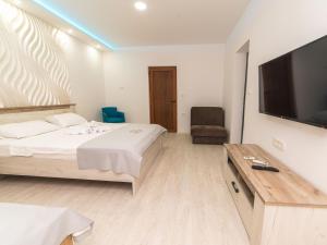 TV a/nebo společenská místnost v ubytování Hotel Royal Garden
