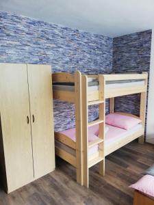 Postel nebo postele na pokoji v ubytování Apartmany Agatha
