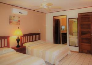 Cama o camas de una habitación en Flamingo Marina Hotel