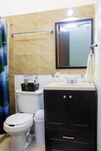 Koupelna v ubytování Casa NE + 7 fotografií