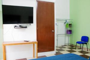 TV a/nebo společenská místnost v ubytování Casa NE
