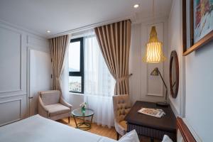Ліжко або ліжка в номері Menora Grand Da Nang