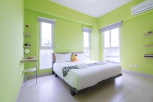 Rúm í herbergi á Amalfi Homestay