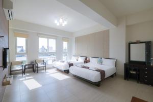 Rúm í herbergi á Amalfi Homestay