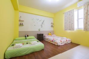 Rúm í herbergi á Amalfi Homestay