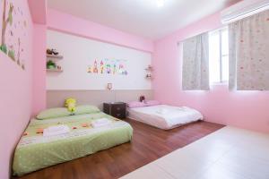 Rúm í herbergi á Amalfi Homestay