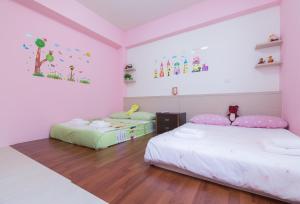 Rúm í herbergi á Amalfi Homestay