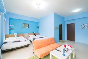 Rúm í herbergi á Amalfi Homestay