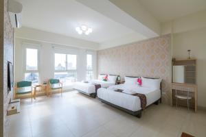 Rúm í herbergi á Amalfi Homestay