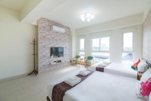 Rúm í herbergi á Amalfi Homestay