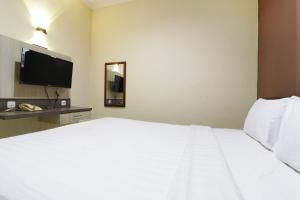 TV a/nebo společenská místnost v ubytování Hotel Istana Bungur