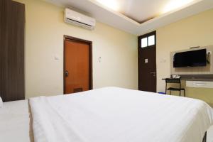 TV a/nebo společenská místnost v ubytování Hotel Istana Bungur