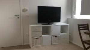 TV a/nebo společenská místnost v ubytování Molo35
