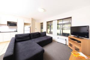TV o dispositivi per l'intrattenimento presso Seashells Beachfront Resort