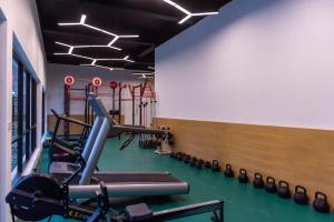 Fitness centrum a/nebo fitness zařízení v ubytování Pacific Hotel & Spa + 37 fotografií