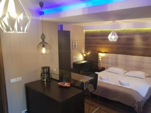 Katil atau katil-katil dalam bilik di Daan Apartments
