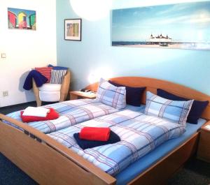 Postel nebo postele na pokoji v ubytování Ferienwohnungen Schulte