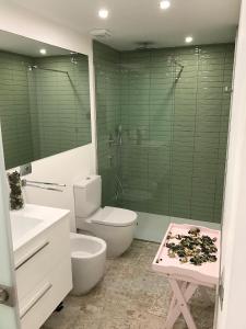 Kúpeľňa v ubytovaní Apartment Mareverde Fañabe + 8 fotografií
