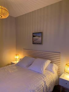 Postel nebo postele na pokoji v ubytování Appartement de 95 m2 bien situé