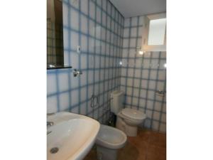 Koupelna v ubytování Apartamento frente al mar y en el centro + 12 fotografií