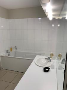 Koupelna v ubytování Appartement de 95 m2 bien situé + 31 fotografií