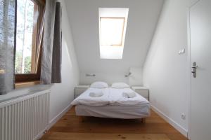 Postel nebo postele na pokoji v ubytování Osada Osjaków + 37 fotografií