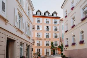 a hotel in the city of lyon with buildings at Huber's Hotel in Baden-Baden