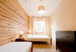 Ένα ή περισσότερα κρεβάτια σε δωμάτιο στο Majesi Apartments