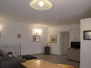 a living room with a couch and a table at Casa Margherita in Parghelia