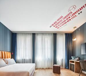 Postel nebo postele na pokoji v ubytování The Modernist Hotel