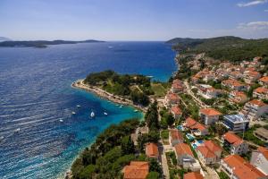 an aerial view of a town on the shore of the ocean at Villa Mare, free breakfast, 80 m from sea - DIRECT LANDLORD in Hvar