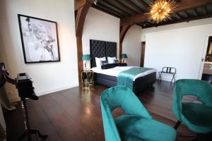 Katil atau katil-katil dalam bilik di Boutique Hotel Steenhof Suites - Adults Only