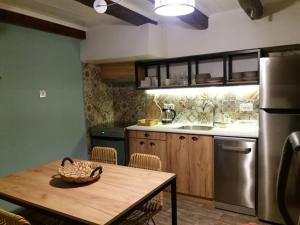Kuchyň nebo kuchyňský kout v ubytování Fivos Residence