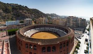 an aerial view of a building in a city at Hotel MS Maestranza Málaga in Málaga