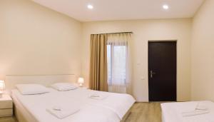 Katil atau katil-katil dalam bilik di Guest House Oxygen
