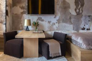 Khu vực ghế ngồi tại Grau Roig Andorra Boutique Hotel & Spa