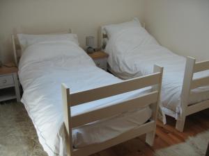 Gite du Puits - Bréville tesisinde bir odada yatak veya yataklar