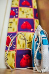 a wii remote sitting on top of a table at Kvartirkoff na Polku Azov 32b in Kyiv +3 photos