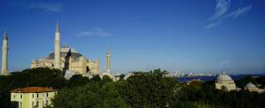 a view of a city with mosques on a hill at Fuego Design Suites in Istanbul