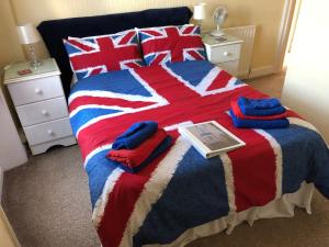 Katil atau katil-katil dalam bilik di Beachcomber Guesthouse